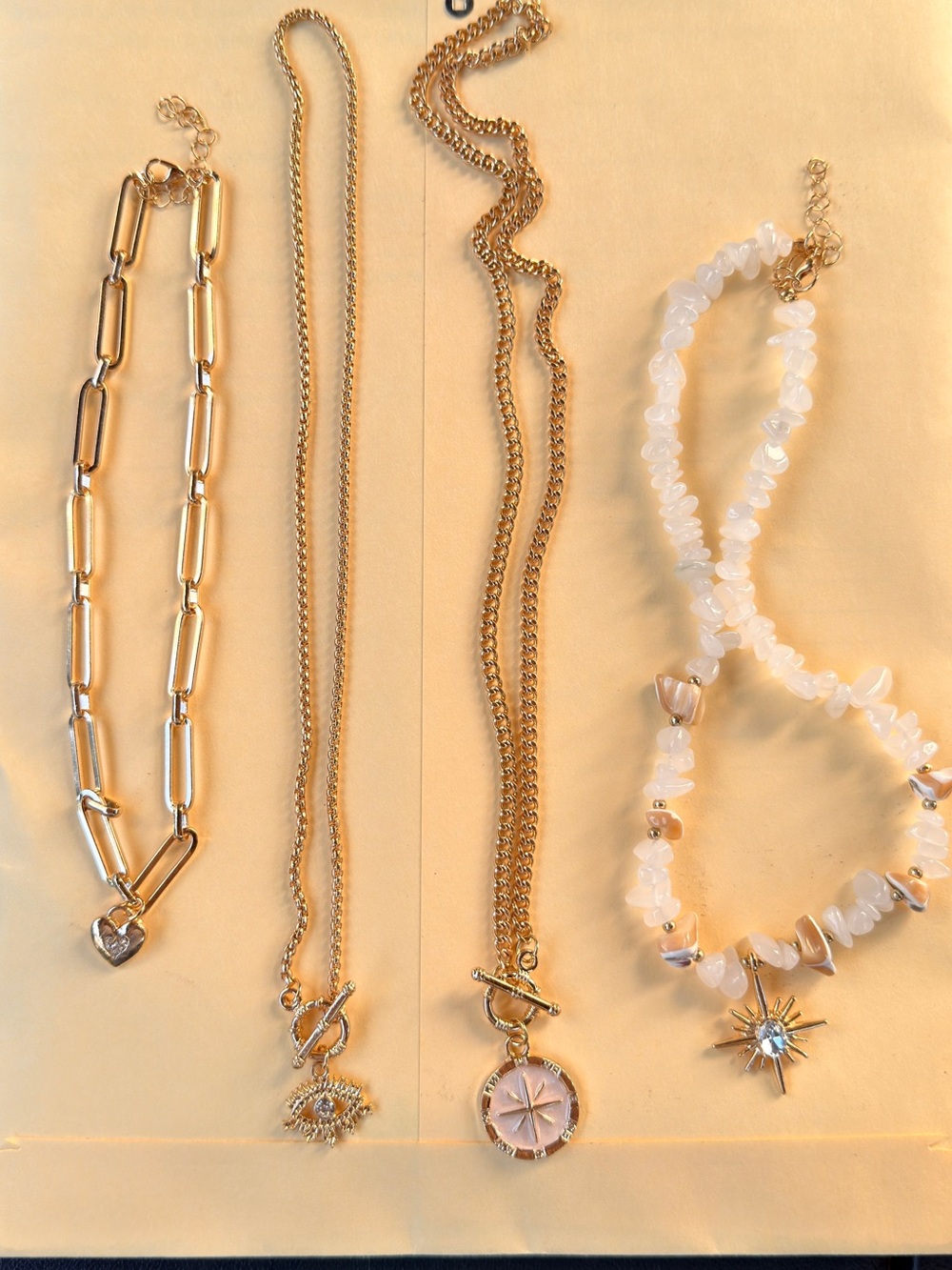 Gold and White Layered Charm Necklace Set